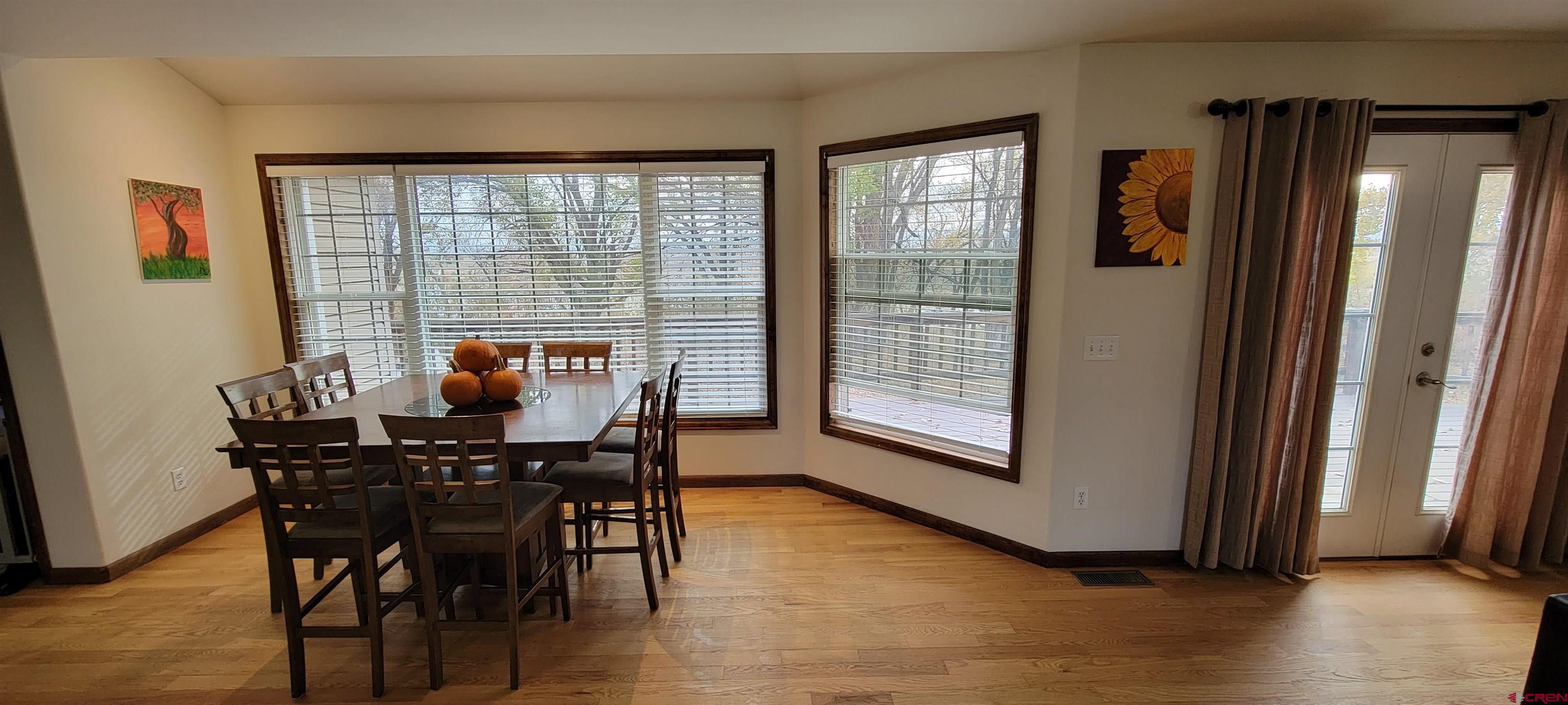 18424 F Road Delta, CO 81416 - Photo 8 of 35 a view of a dining room with furniture and window