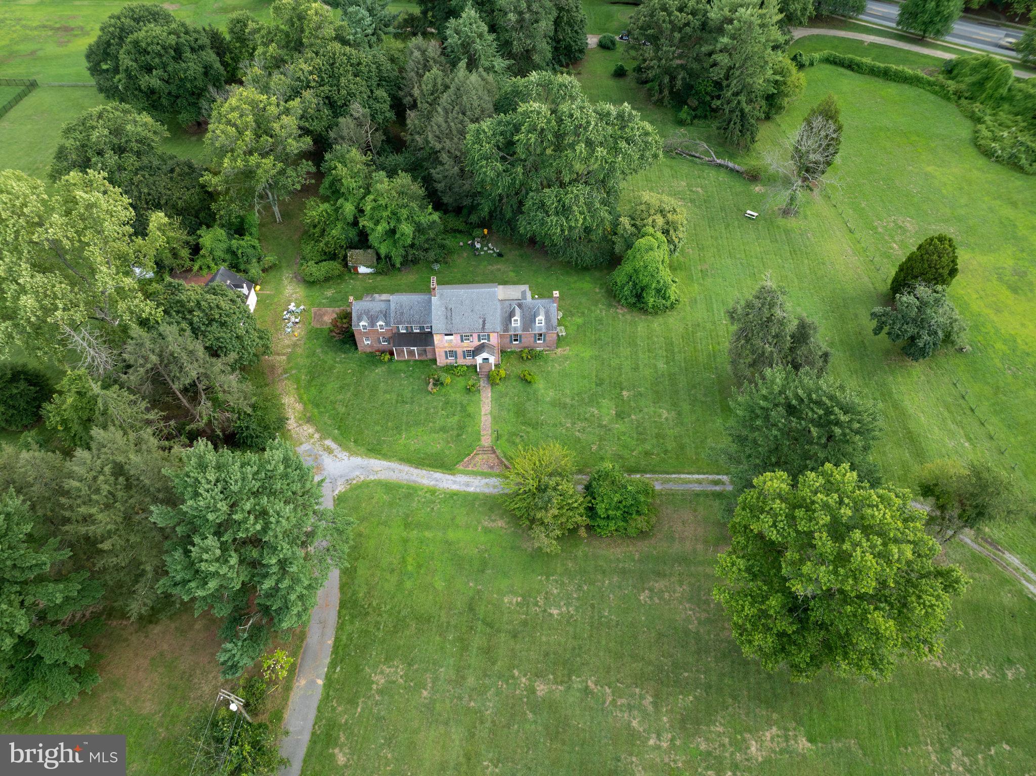 2173 Johns Hopkins Road Gambrills, MD 21054 - Photo 4 of 18 a view of a garden with a lake