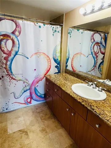 a bathroom with a sink and a toilet