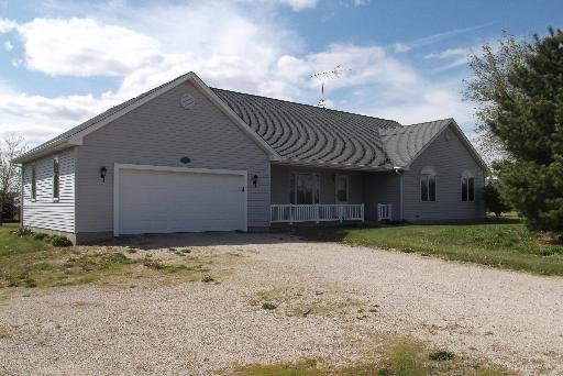 1279 Locust Road Lee, IL 60530 - Photo 1 of 14 a front view of a house with a yard
