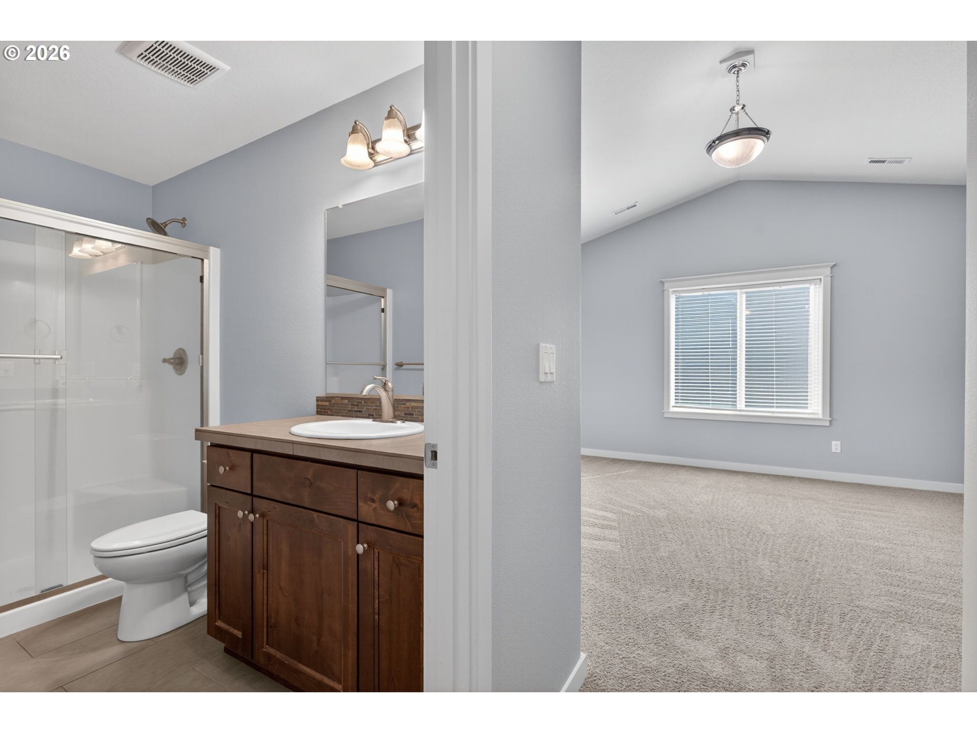 410 Rentfro Way Newberg, OR 97132 - Photo 14 of 39 a bathroom with a sink a toilet and shower