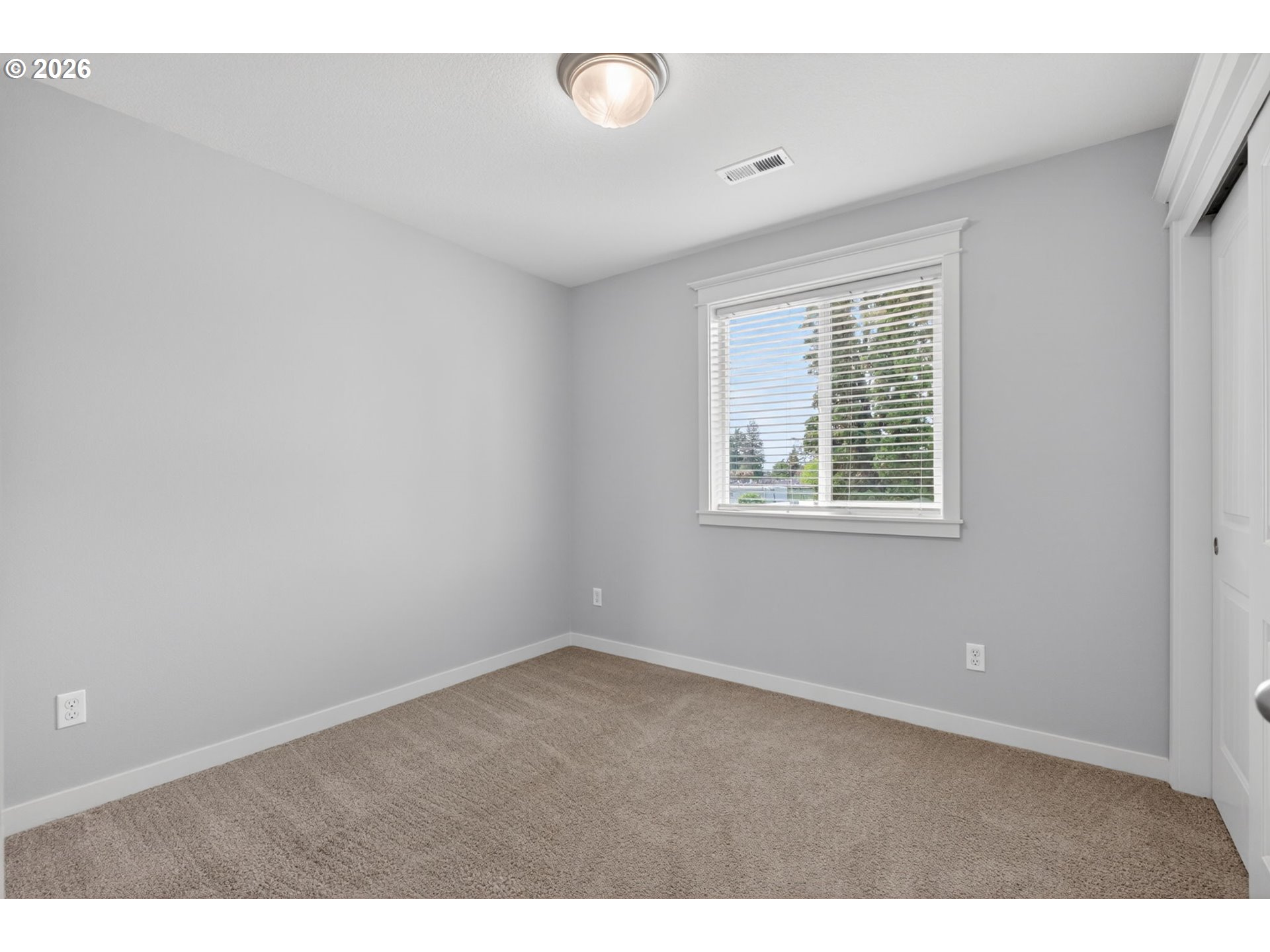 410 Rentfro Way Newberg, OR 97132 - Photo 19 of 39 a view of an empty room with a window