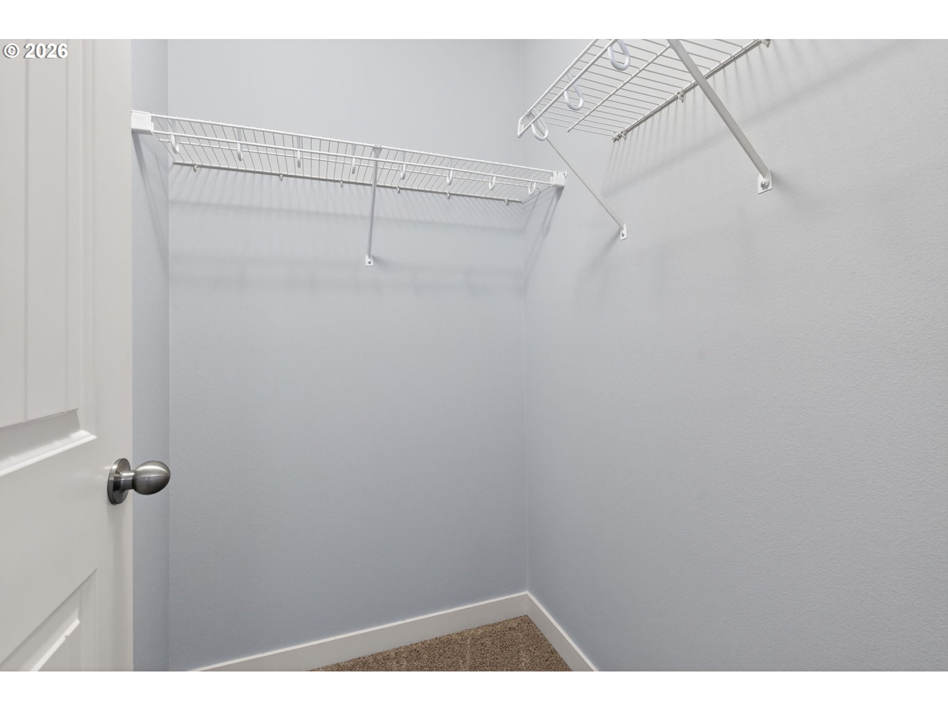 410 Rentfro Way Newberg, OR 97132 - Photo 23 of 39 a view of a room with racks on the wall