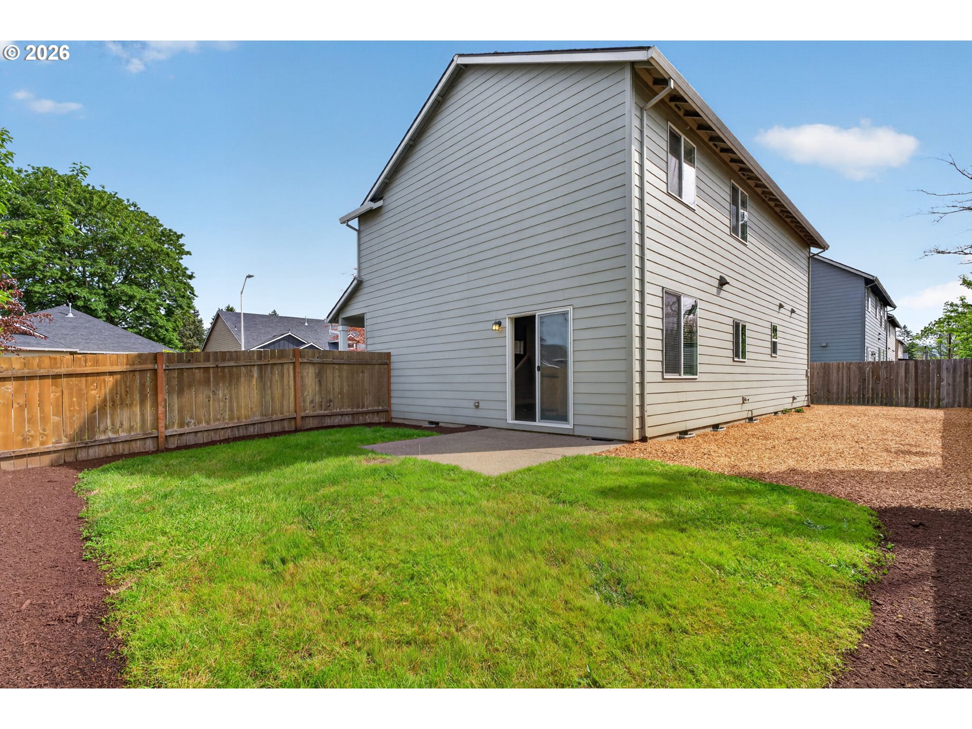 410 Rentfro Way Newberg, OR 97132 - Photo 28 of 39 a backyard of a house with table and chairs