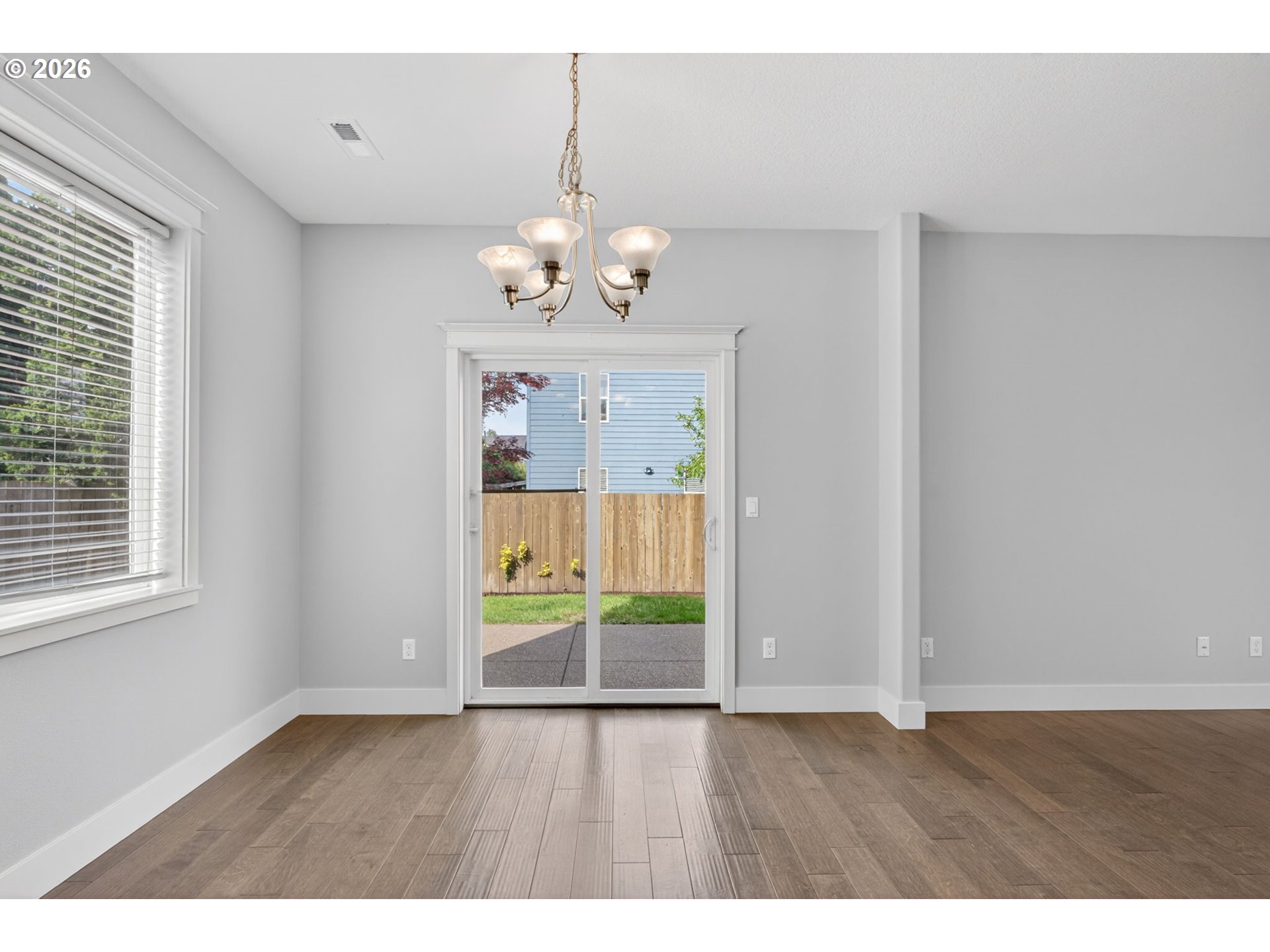 410 Rentfro Way Newberg, OR 97132 - Photo 8 of 39 a view of an empty room with a window