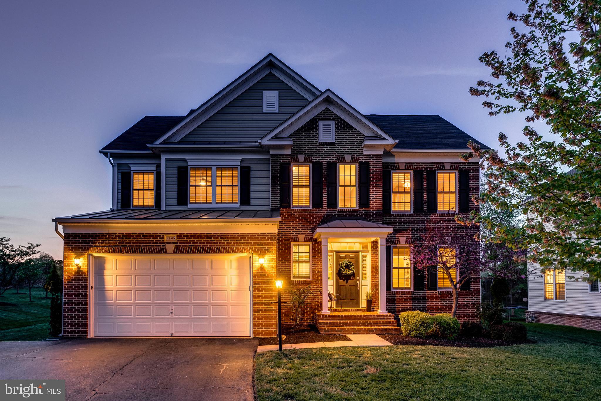 42310 Rising Moon Place Brambleton, VA 20148 - Photo 1 of 1 Welcome to 42310 Rising Moon Pl at Twilight