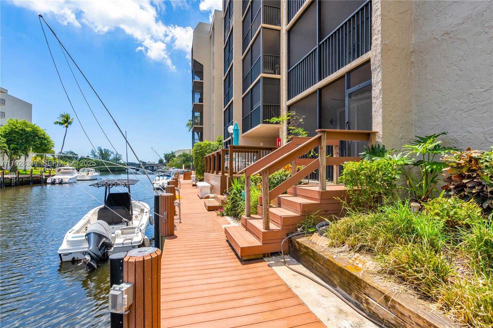12 Royal Palm Way, Unit 103 Boca Raton, FL 33432 - Photo 18 of 29 a view of sitting area with furniture and wooden floor