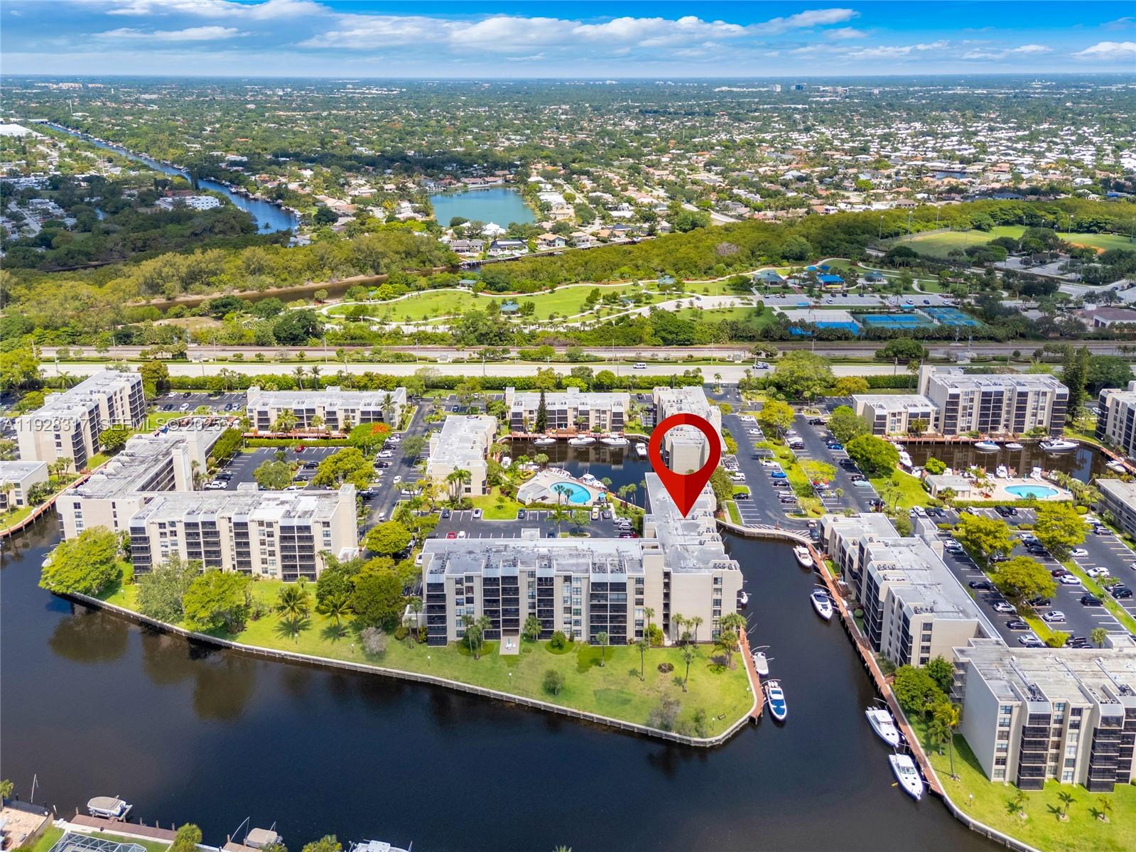 12 Royal Palm Way, Unit 103 Boca Raton, FL 33432 - Photo 22 of 29 an aerial view of residential houses with outdoor space and swimming pool