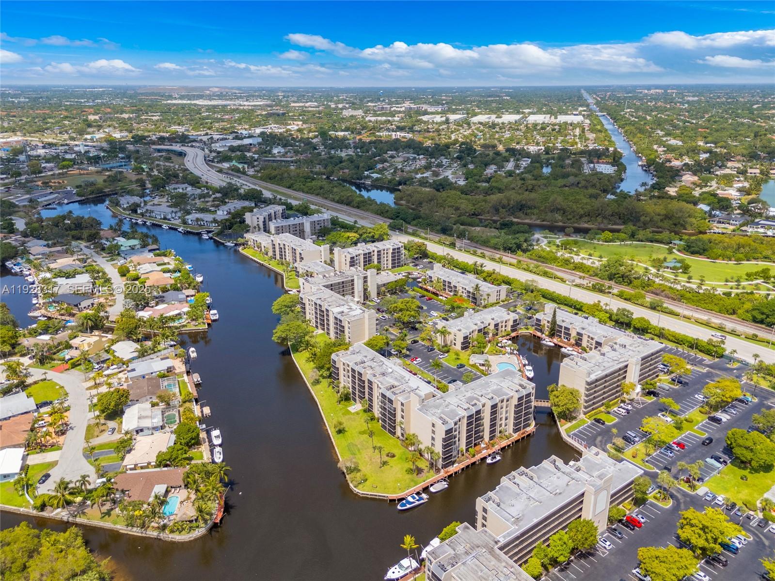 12 Royal Palm Way, Unit 103 Boca Raton, FL 33432 - Photo 24 of 29 an aerial view of residential houses with outdoor space
