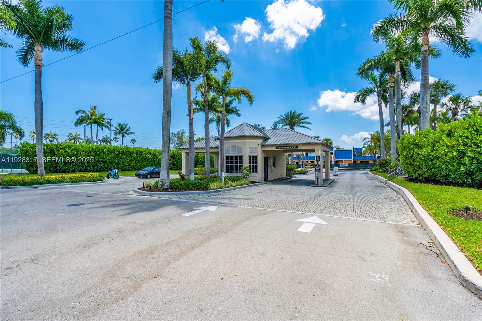 12 Royal Palm Way, Unit 103 Boca Raton, FL 33432 - Photo 29 of 29 a view of a house with a yard and potted plants
