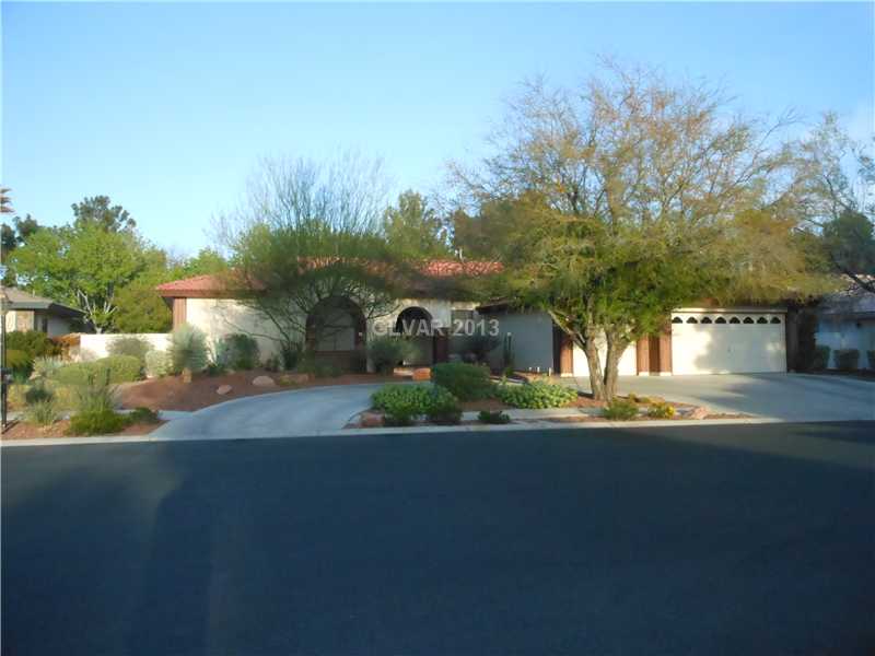 4716 Monument Valley Road Las Vegas, NV 89129 - Photo 1 of 31 Property Photo. Beautiful exterior landscaped home in gated community.