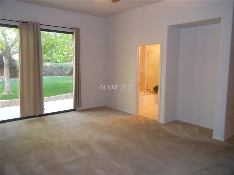 4716 Monument Valley Road Las Vegas, NV 89129 - Photo 12 of 31 Property Photo. Master bedroom to master bath.
