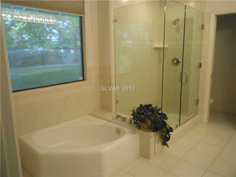 4716 Monument Valley Road Las Vegas, NV 89129 - Photo 13 of 31 Property Photo. Wonderful master bath with separate tub.