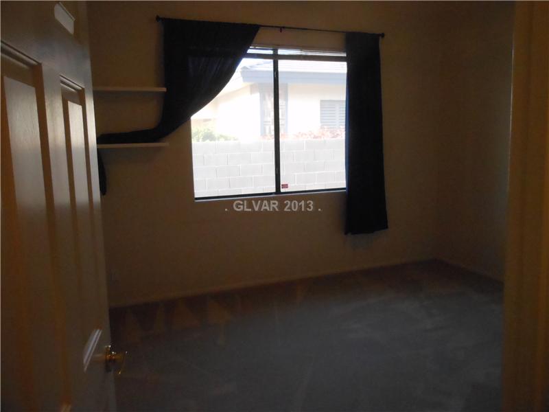 4716 Monument Valley Road Las Vegas, NV 89129 - Photo 19 of 31 Property Photo. Bedroom 3 with ceiling fan.