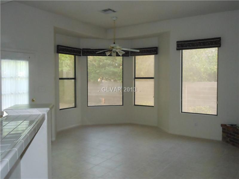 4716 Monument Valley Road Las Vegas, NV 89129 - Photo 8 of 31 Property Photo. Nook with ceiling fan.