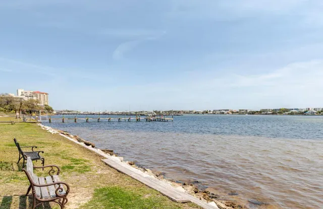 a view of a swimming pool and an ocean