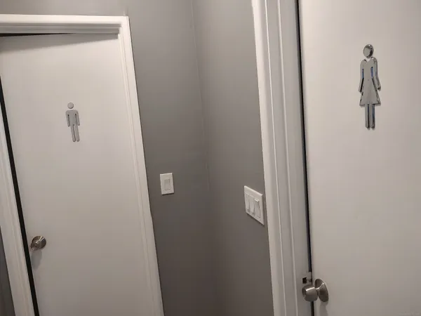 a bed room with a bed and a couch