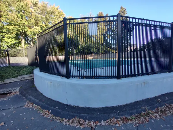 a view of a balcony with a pot