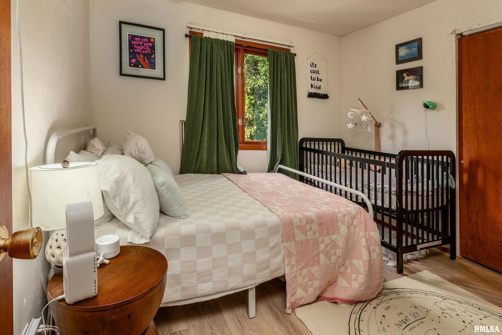 183 Heritage Road Carbondale, IL 62903 - Photo 34 of 50 a bedroom with a bed and a window