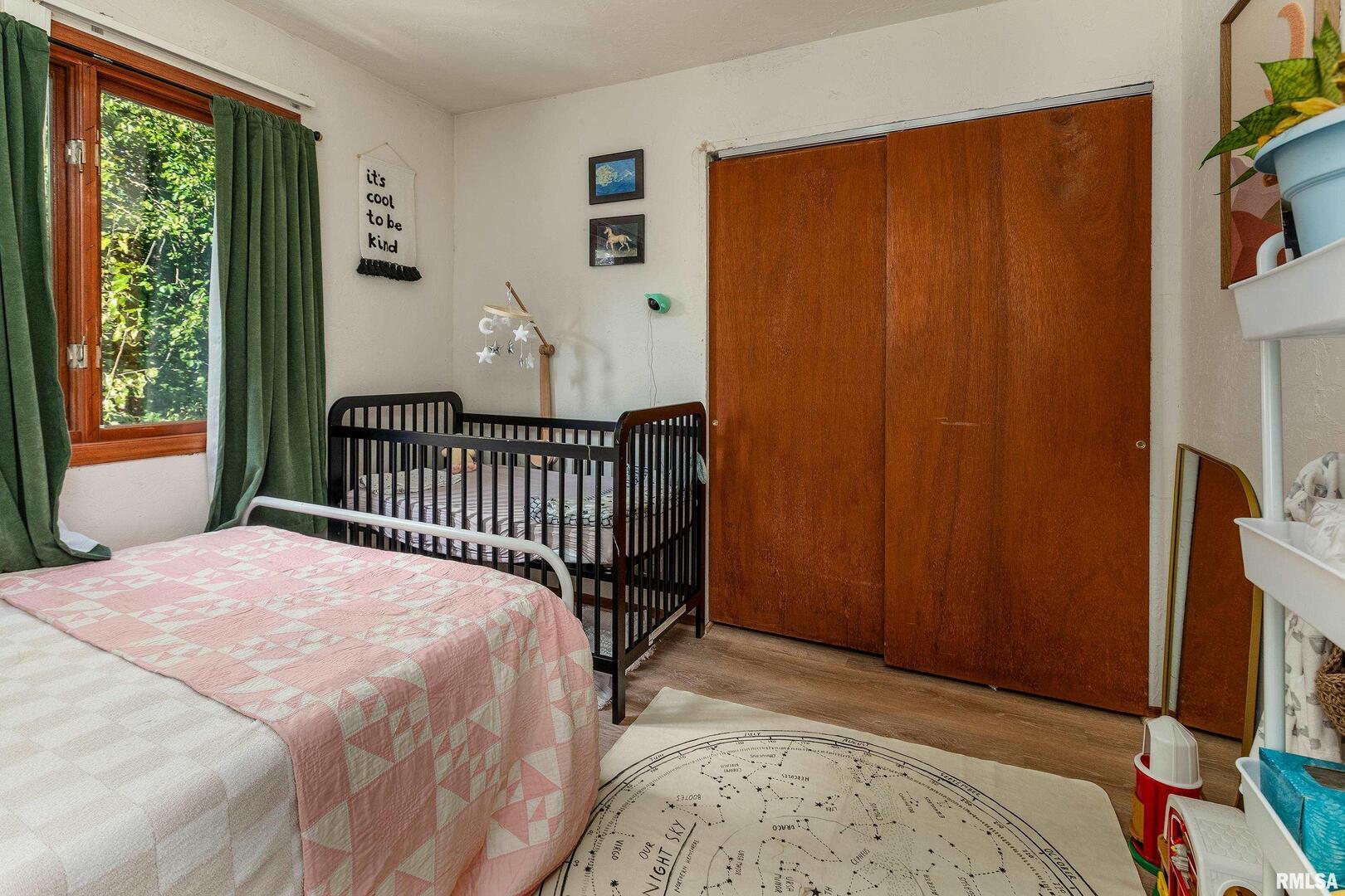 183 Heritage Road Carbondale, IL 62903 - Photo 35 of 50 a bedroom with a bed and a window