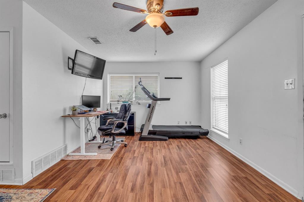 3800 Redstone Road Denton, TX 76209 - Photo 12 of 33 a view of workspace with wooden floor