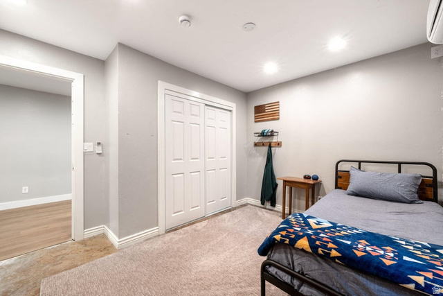 7776 Wagon Road East St. George, UT 84770 - Photo 40 of 76 Bedroom with a closet, light colored carpet, and recessed lighting