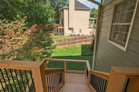 a view of a backyard with porch