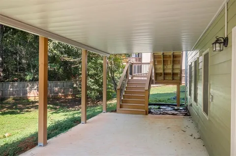 a backyard of a house with lots of green space
