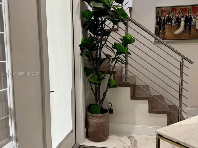 a bathroom with a sink and a window