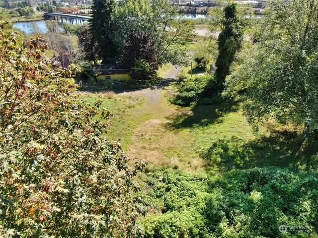 a view of a lake with a house