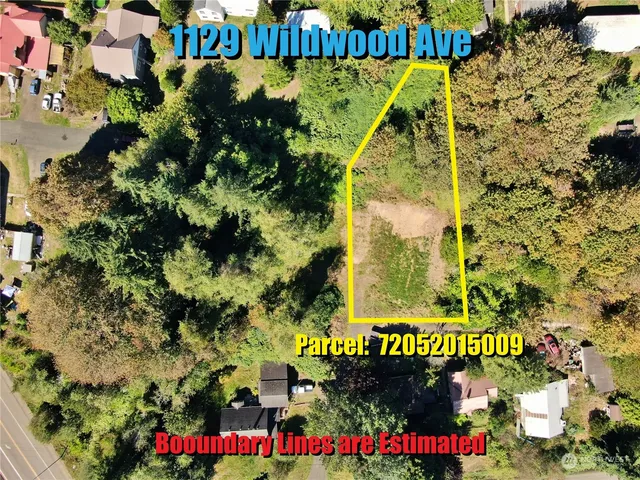 a view of sign board with flowers