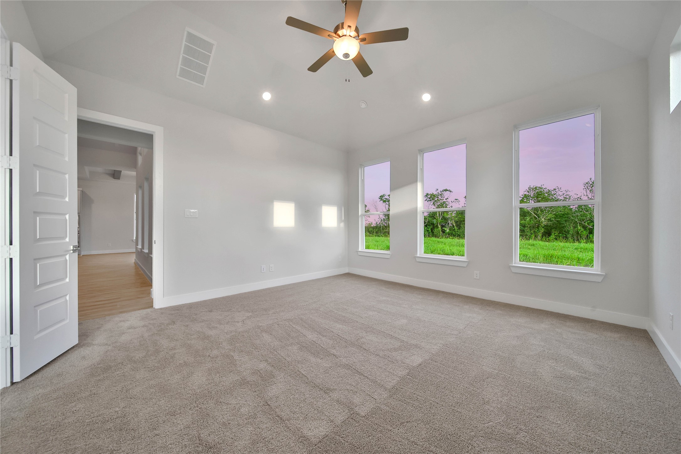 4602 Magnolia Bend Drive Rosharon, TX 77583 - Photo 16 of 39 a view of a livingroom with a ceiling fan and window