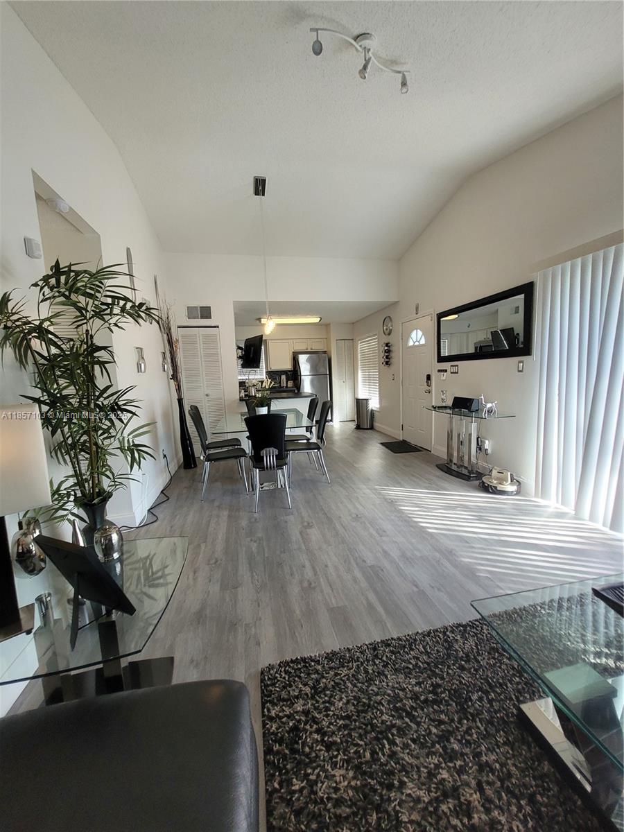 4375 White Pine Avenue, Unit 824 Orlando, FL 32811 - Photo 3 of 12 a view of livingroom with furniture and lounge chair