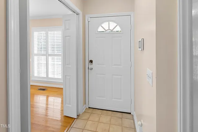 a view of empty room with windows