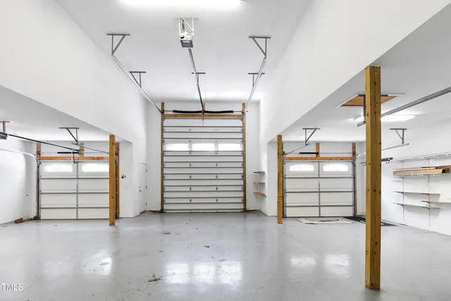 a view of a garage with stairs