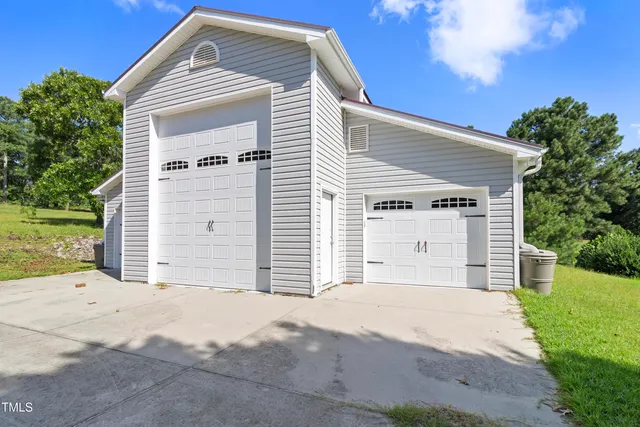 a view of outdoor space with deck and trees
