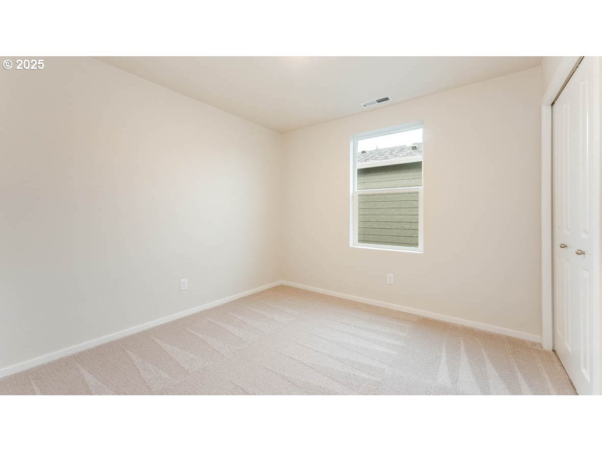 2799 U Street Springfield, OR 97477 - Photo 17 of 27 a open hall with a bench