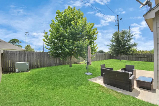 a view of a garden with an outdoor space