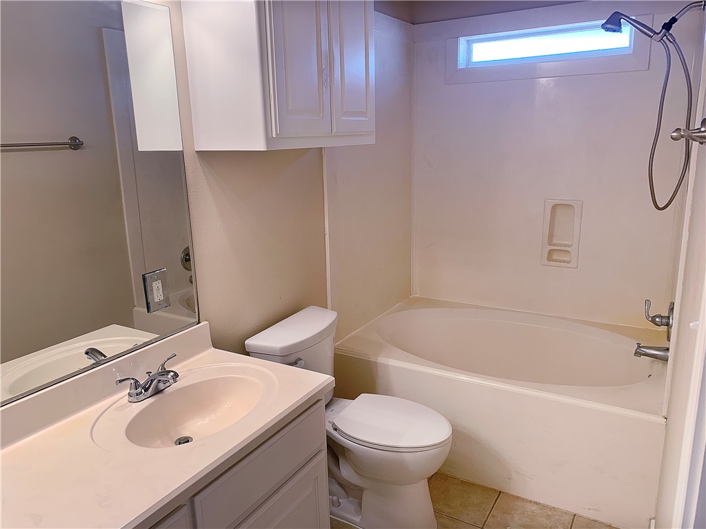 105 Karten Lane College Station, TX 77845 - Photo 20 of 26 a bathroom with a sink a toilet and shower
