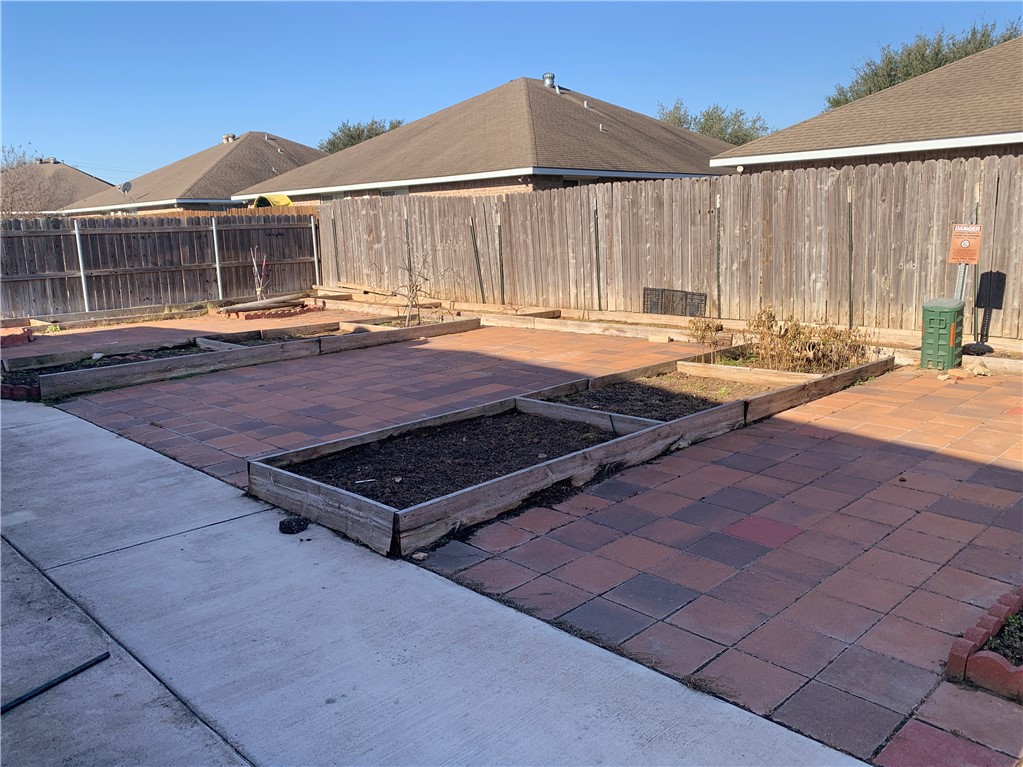 105 Karten Lane College Station, TX 77845 - Photo 23 of 26 a view of a patio with a table and chairs