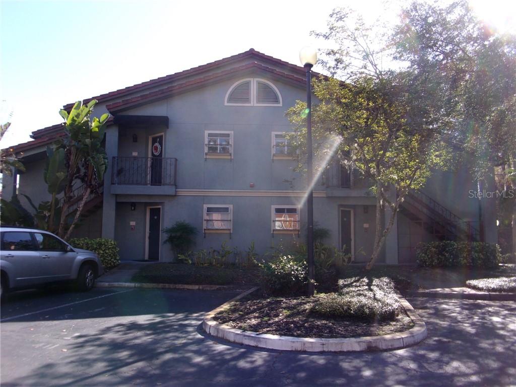 a front view of a house with yard