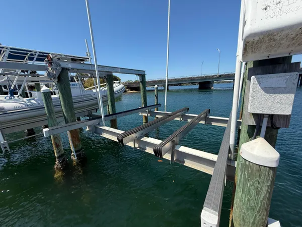 a view of a chairs and table in patio