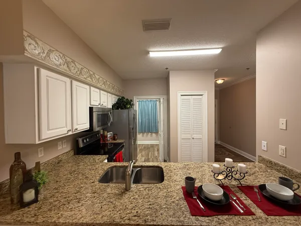 a bedroom with bed or couch and a dresser