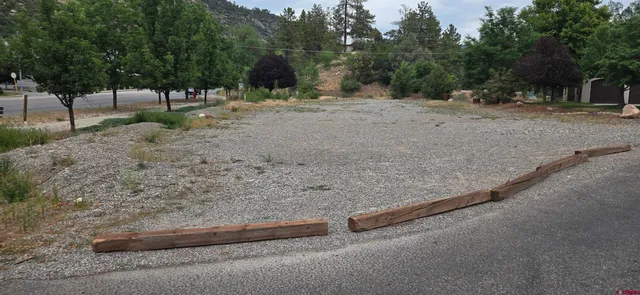 a view of backyard with green space