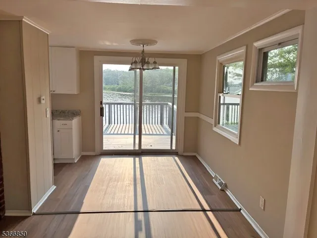 a view of hallway with windows