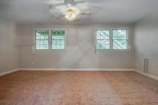 a view of an house with backyard space