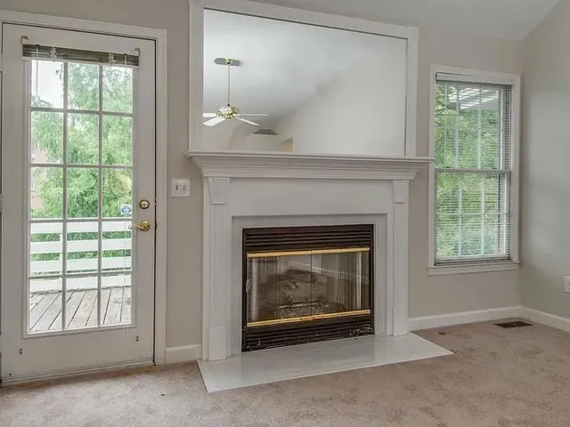 an empty room with a large window