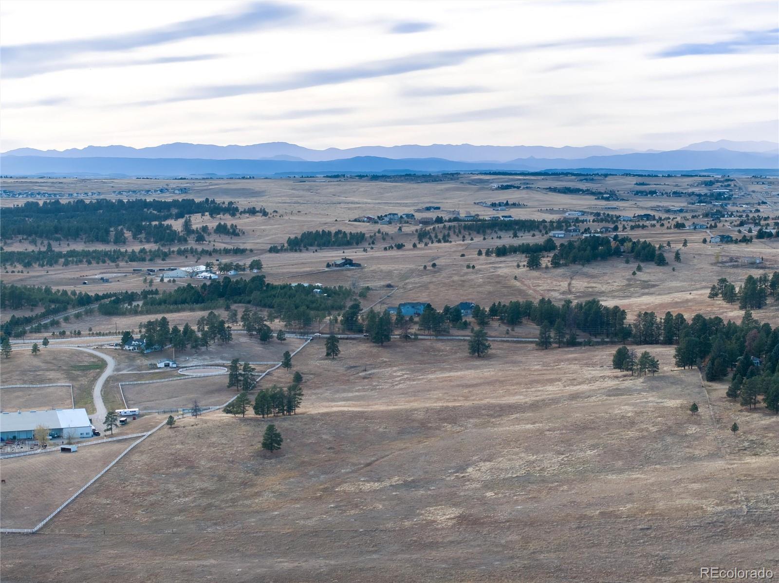 3074 County Road 166 Elizabeth, CO 80107 - Photo 4 of 13 an aerial view of multiple house