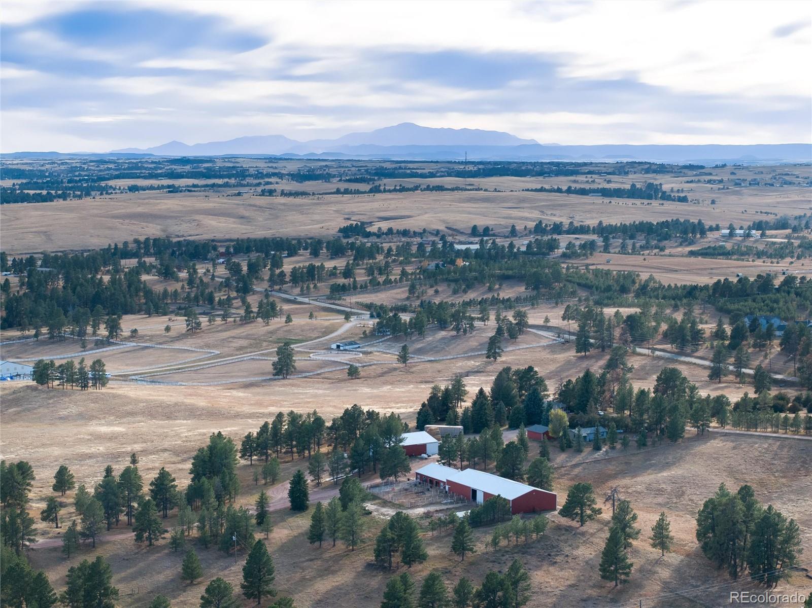 3074 County Road 166 Elizabeth, CO 80107 - Photo 7 of 13 a view of a lake with a city