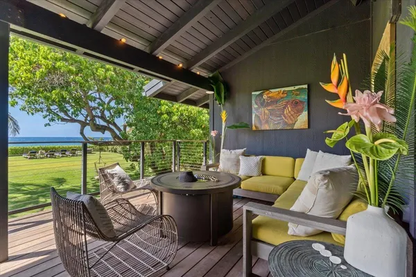 a outdoor living space with furniture and garden view